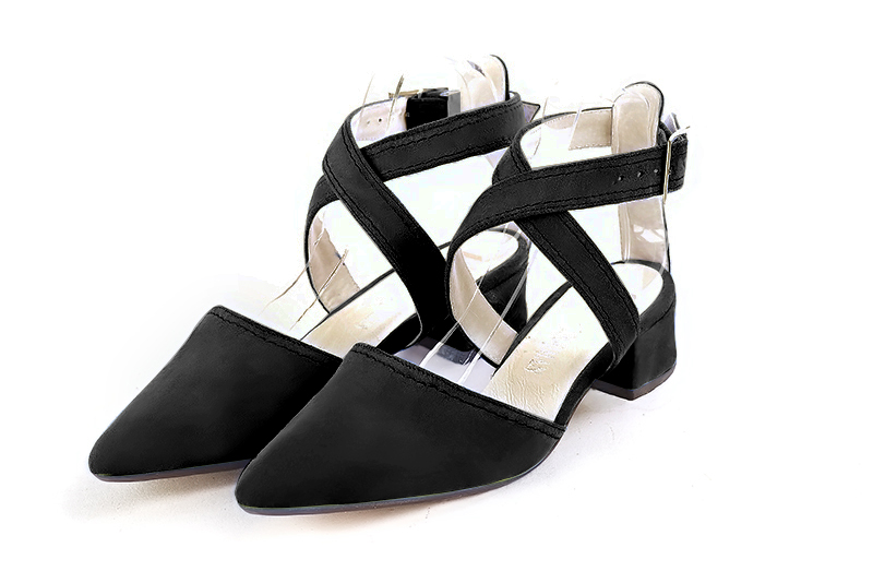Matt black women's open back shoes, with crossed straps. Tapered toe. Low flare heels. Front view - Florence KOOIJMAN